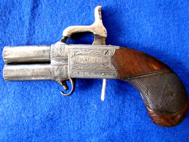 An Irish .38 cal. Percussion pocket pistol with swivel barrels made by Rigby of Dublin circa 1845 — image 4
